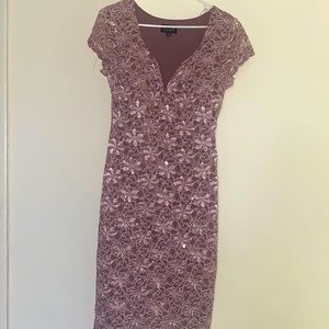 Dress size 10  brand Connected 68% Nylon 39%Polyerter 1% Spandex